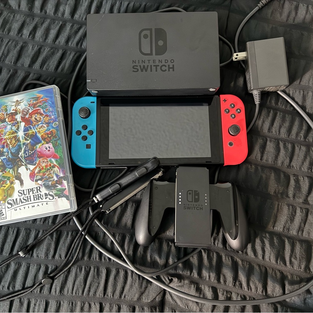 Nintendo Switch Console with Red and Blue Joy-Con